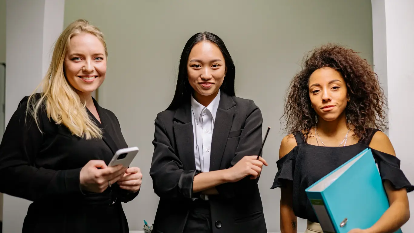 three women in blazer